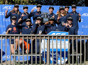 Syracuse's men's cross country team celebrates its 2015 Atlantic Coast Conference championship. The Orange won again in 2016.