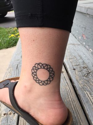 Emma Lohrs' tattoo based on a childhood toy reminds her of spending time with family.  Even though the tattoo reminds her of family, Lohrs was hesitant to tell her mother knowing she didn't approve.