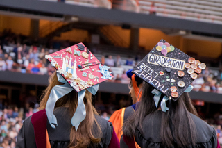 Some students used materials such as paper to create intricate graduation cap designs. 